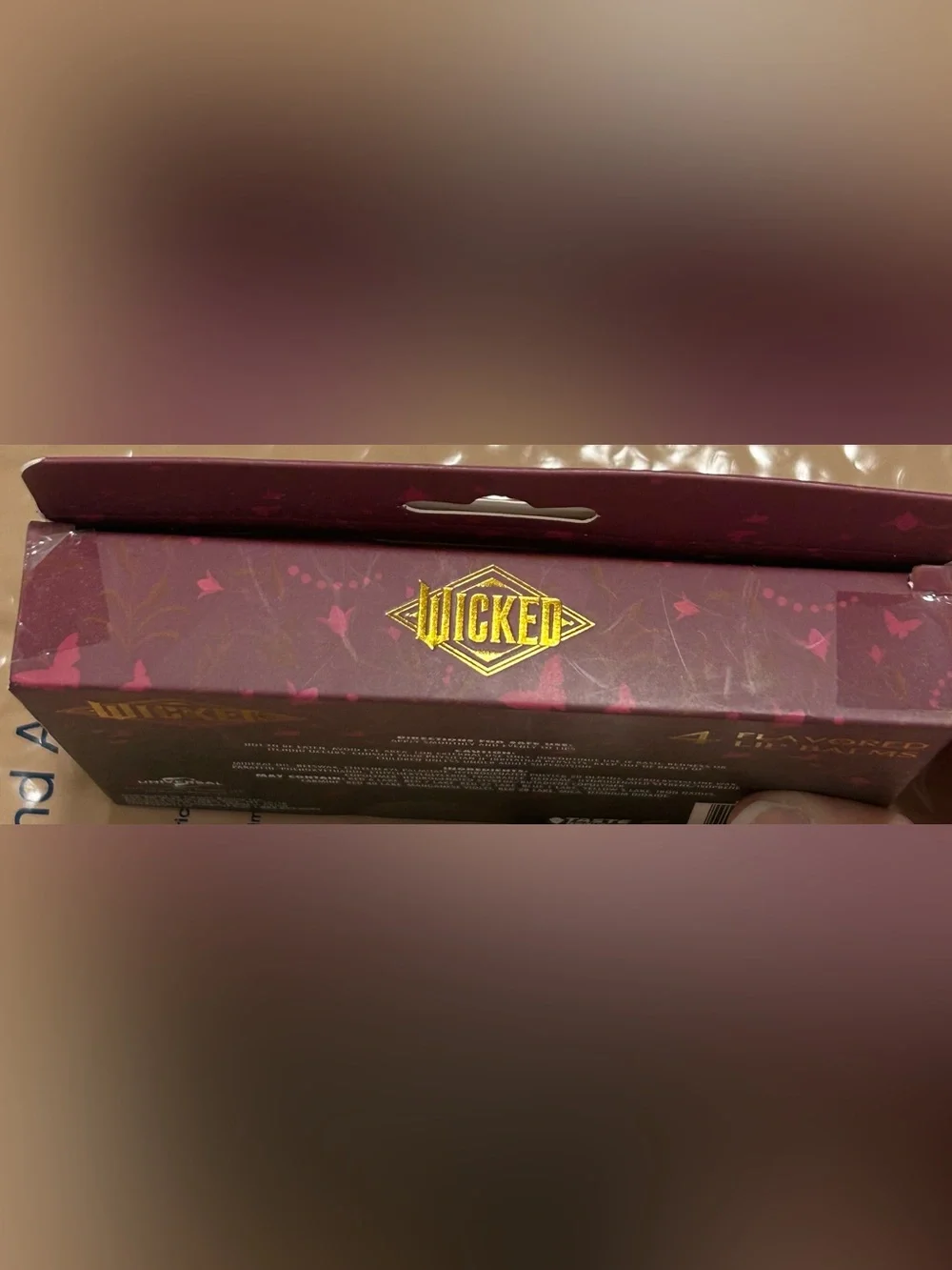 Wicked 4 Lip Balm Set. TASTE BEAUTY. 2 Glinda, 2 Elphaba. NWT. Universal Stud.